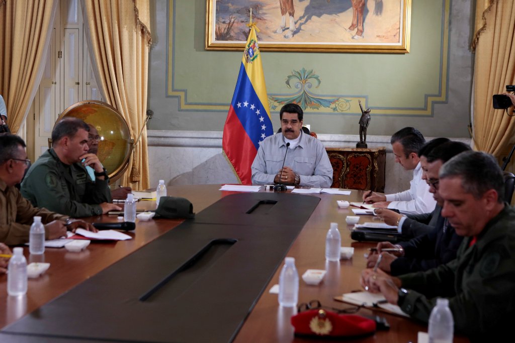 Venezuela's President Nicolas Maduro (C) speaks during a meeting with ministers at Miraflores Palace in Caracas, Venezuela April 16, 2017. Miraflores Palace/Handout via REUTERS.