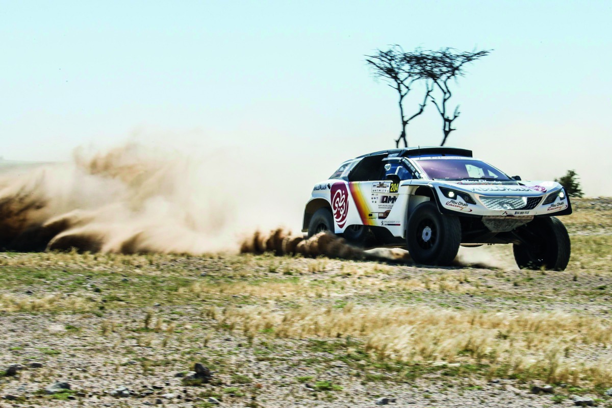 United Arab Emirates' Sheikh Khalid Al Qassimi on his way to claim a fine stage win in his Peugeot 3008 DKR during the Qatar Cross-Country Rally yesterday. 