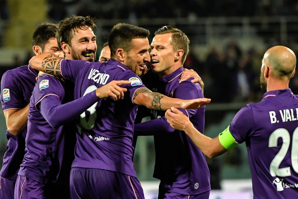 Fiorentina's defender from Italy Davide Astori (2ndL) celebrates with teammates after scoring during the Italian Serie A football match Fiorentina vs Inter Milan, on April 22, 2017 at Florence's 