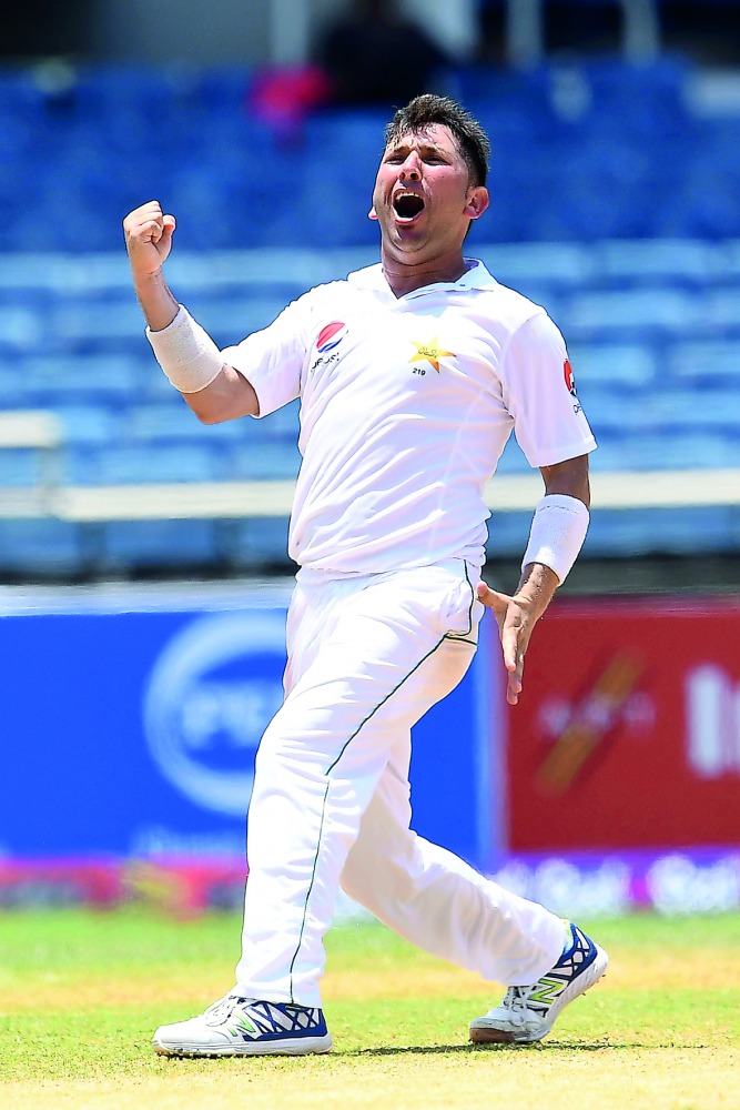 Pakistan bowler Yasir Shah celebrates dismissing West Indies' Alzarri Joseph on the final day of the first Test at the Sabina Park in Kingston, Jamaica