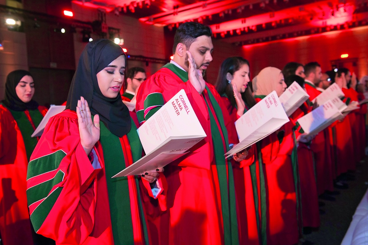 Some of the graduates taking the Hippocratic Oath.
