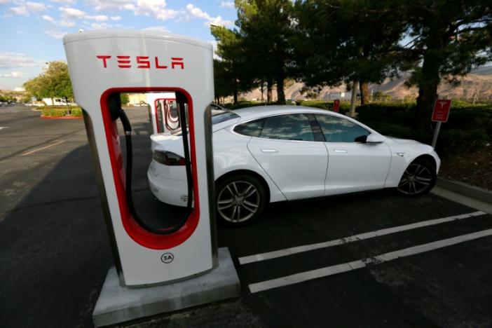 A Tesla Model S charges at a Tesla Supercharger station in Cabazon, California, US May 18, 2016. Reuters/Sam Mircovich/File Photo