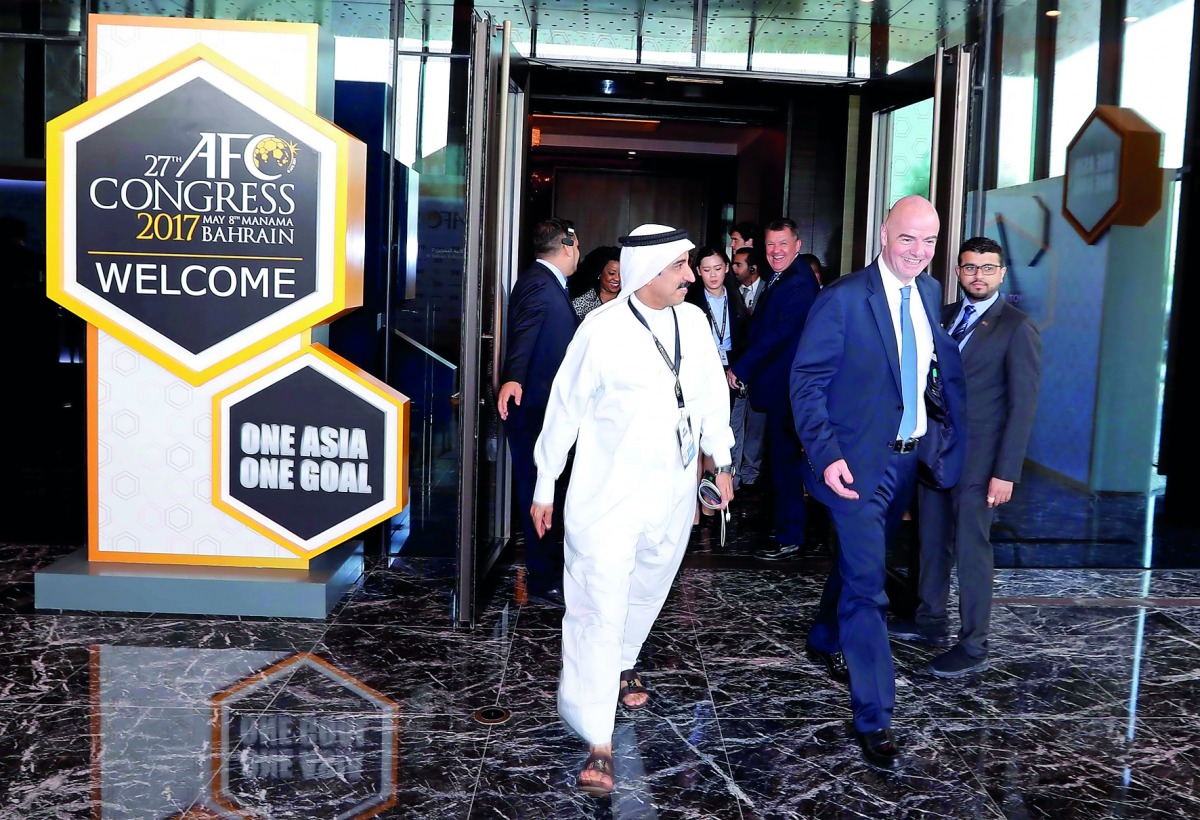 FIFA President Gianni Infantino (right) leaves after attending the inaugural session of 27th AFC Congress in Manama, Bahrain. 