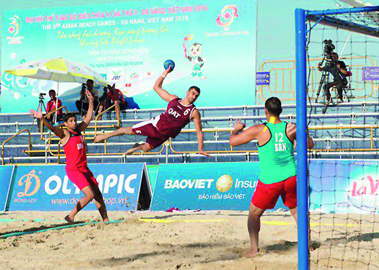 A Qatari beach handball player leaps to score in this file photo. Qatar will be looking to defend their Asian Beach Handball Championship title at the Thai city of Pattaya. 
