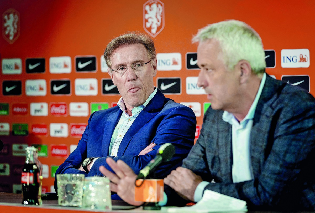 Technical Director of the Royal Dutch Football Federation (KNVB) Hans van Breukelen (left) and Commercial Director Jean Paul Decossaux address a press conference yesterday in Zeist, after veteran coach Dick Advocaat reached an agreement with KNVB. 
