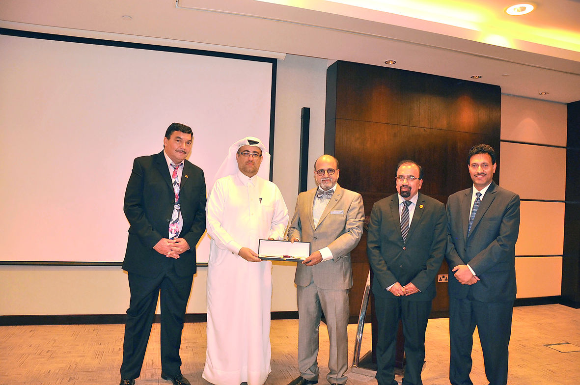 Participants at the IIA seminar pose for a group photo at Oryx Rotana Hotel, in Doha.
