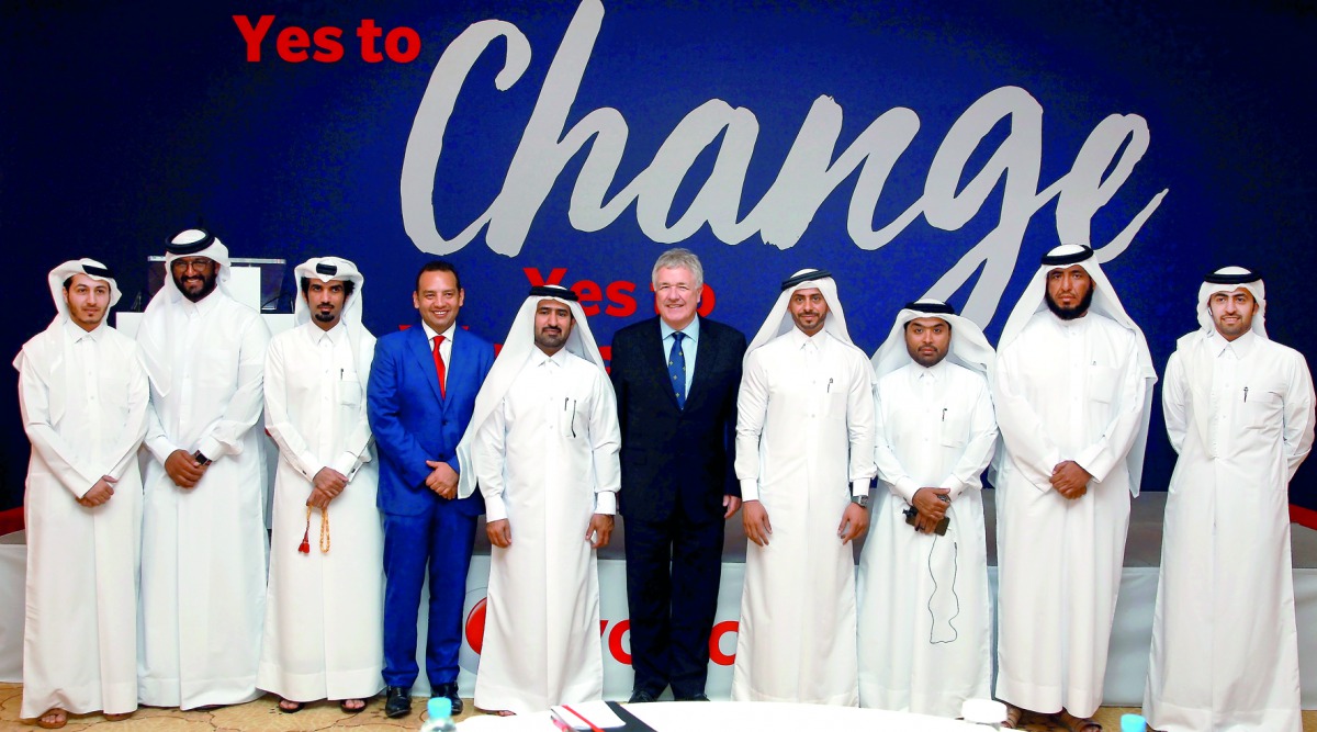 Vodafone Qatar CEO Ian Gray (sixth left) and other officials pose for a group photo at the event. Pic: Qassim Rahmatullah/The Peninsula