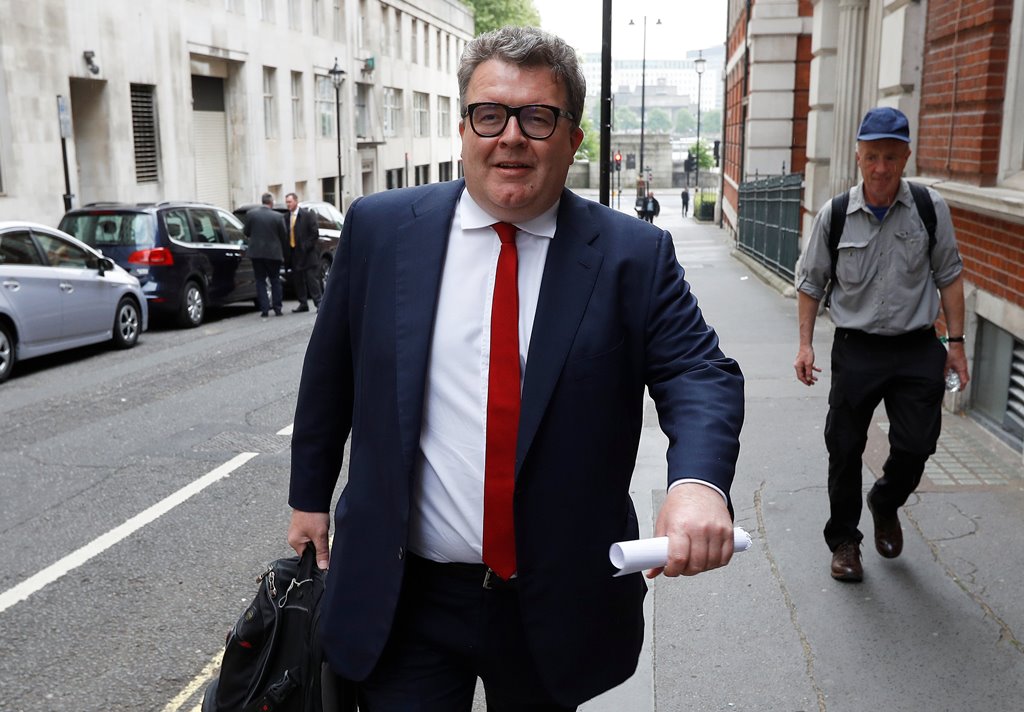 Tom Watson, the deputy leader of Britain's opposition Labour Party leaves a meeting with senior party figures after their election manifesto was leaked to the press, in London, May 11, 2017. Reuters/Peter Nicholls
