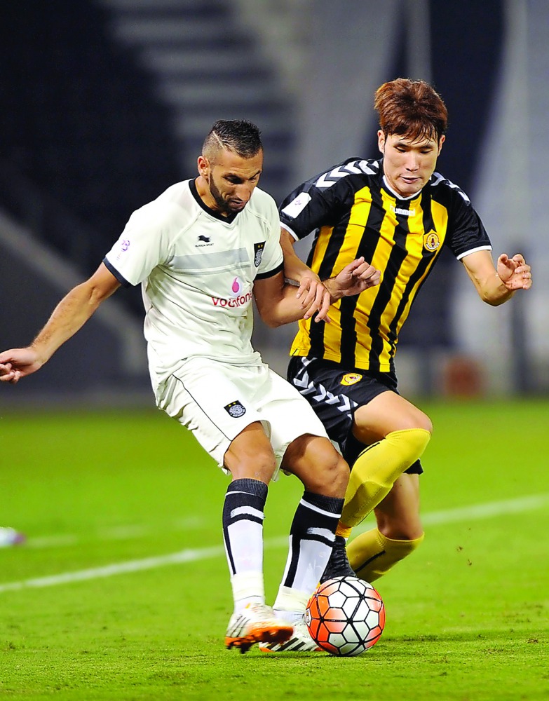 Nadir Belhadj (left) in action in QSL match in this 2015 file picture. 