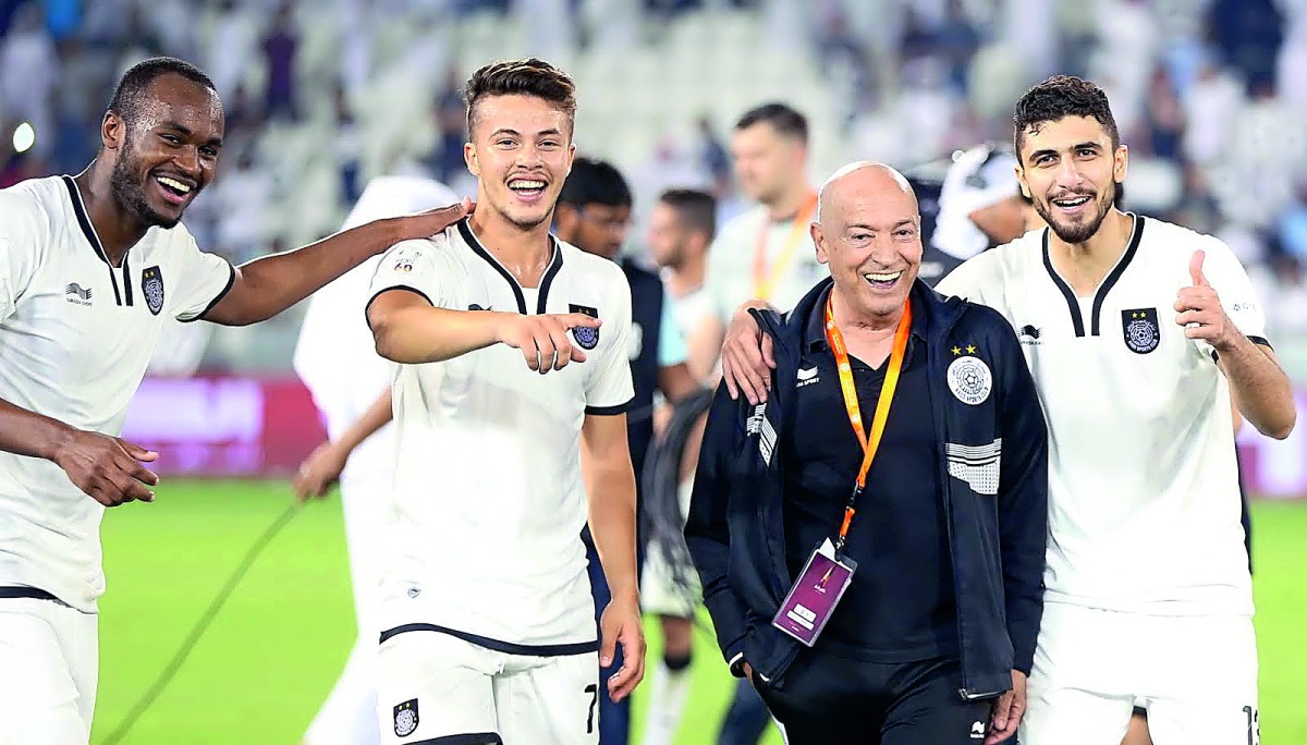 Eyeing another trophy: Al Sadd's head coach Jesualdo Ferreira (centre) celebrates along with his players their 2-1 victory over El Jaish in the Qatar Cup final at Al Sadd Stadium earlier this month. Al Sadd are looking for a double with a win over Al Rayy