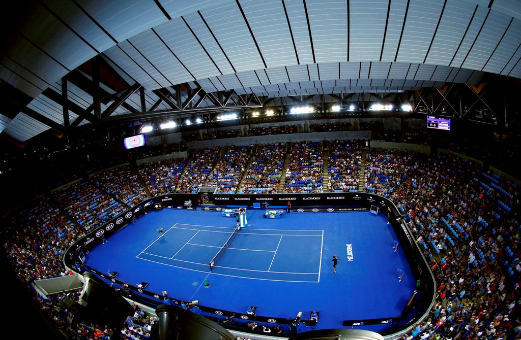 France's Jo-Wilfried Tsonga serves during his third round match against compatriot Pierre-Hugues Herbert, with the roof closed at Margaret Court Arena, at the Australian Open tennis tournament at Melbourne Park, Australia, January 22, 2016. REUTERS/Jason 