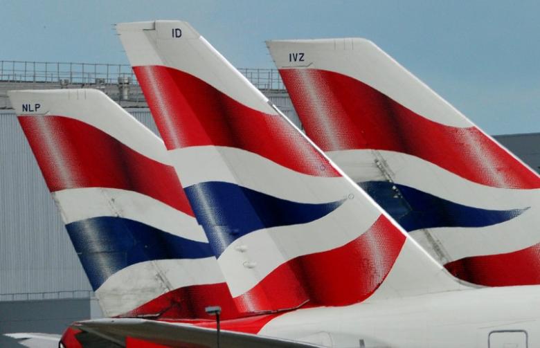 British Airways logos are seen on tailfins at Heathrow Airport in west London, Britain May 12, 2011. (REUTERS/Toby Melville/Files)
