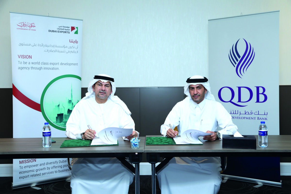 QDB and Dubai Exports officials at the MoU signing  ceremony in Dubai. 