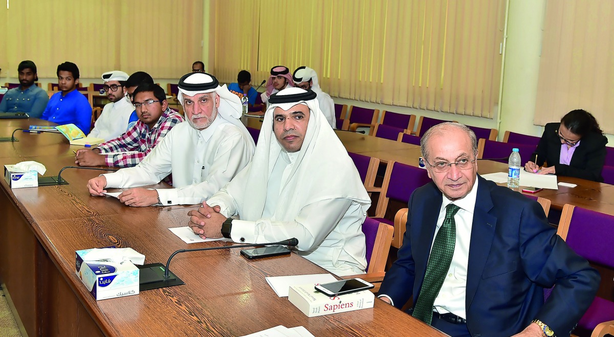 Chair in Middle Eastern Studies Oversight Committee member Dr Hani K Findakly (right) and QU Chief Strategy and Development Officer Dr Darwish Al Emadi (third right) at the event.