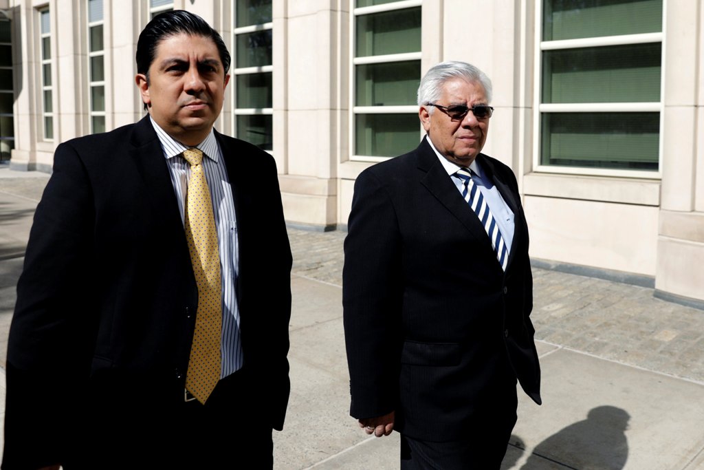 Former secretary general of the Guatemalan football federation Hector Trujillo (R) of Guatemala departs after pleading guilty in Brooklyn Federal Court in the Brooklyn borough of New York, U.S., June 2, 2017. REUTERS/Lucas Jackson
