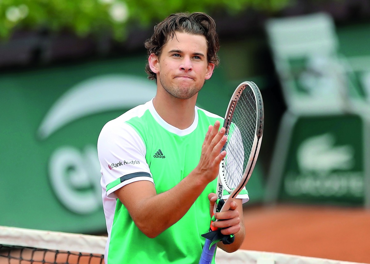 Austria's Dominic Thiem celebrates after winning his match against Serbia's Novak Djokovic at the French Open in Paris, yesterday.