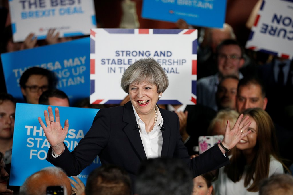 FILE PHOTO - Britain's Prime Minister Theresa May reacts during an election campaign event in Bradford, Britain, June 5, 2017. REUTERS/Phil Noble/File Photo
