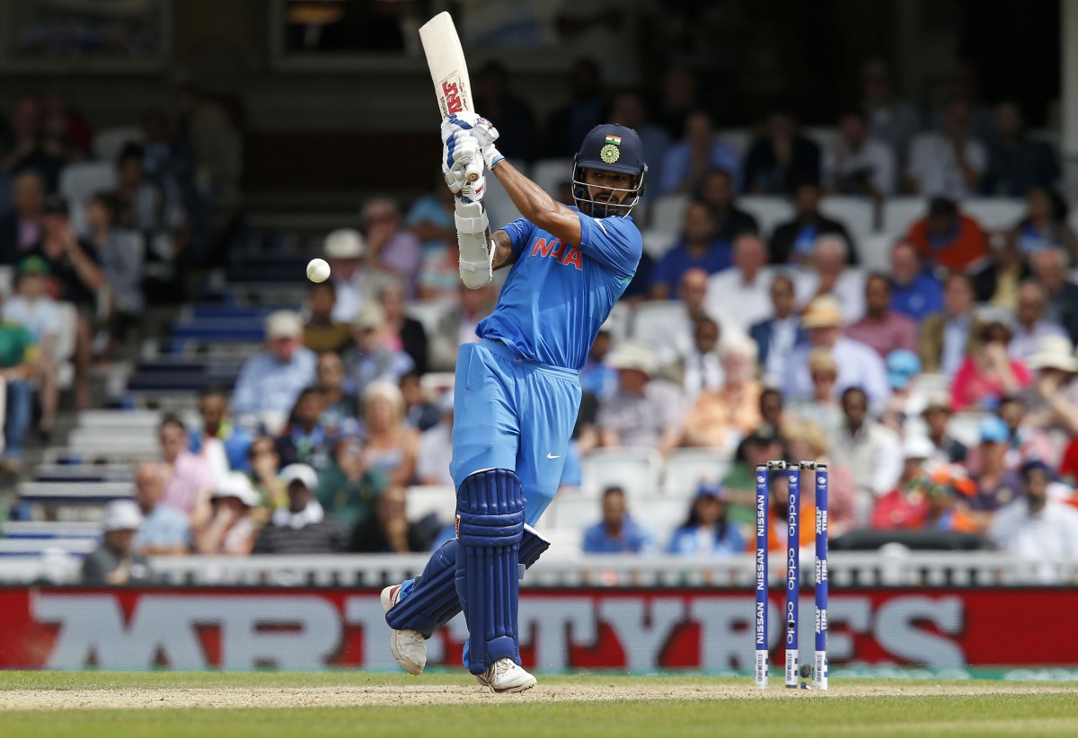 India's Shikhar Dhawan plays a shot during the ICC Champions Trophy match between South Africa and India at The Oval in London on June 11, 2017. (AFP / Ian KINGTON)