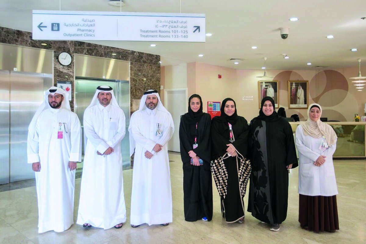 Ooredoo volunteers, with the officials of the Fahad Bin Jassim Kidney Centre, during the visit. 