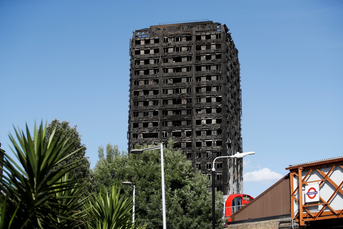 Extensive damage is seen to the Grenfell Tower block which was destroyed in a fire disaster, in north Kensington, West London, Britain June 15, 2017. (REUTERS/Stefan Wermuth)
