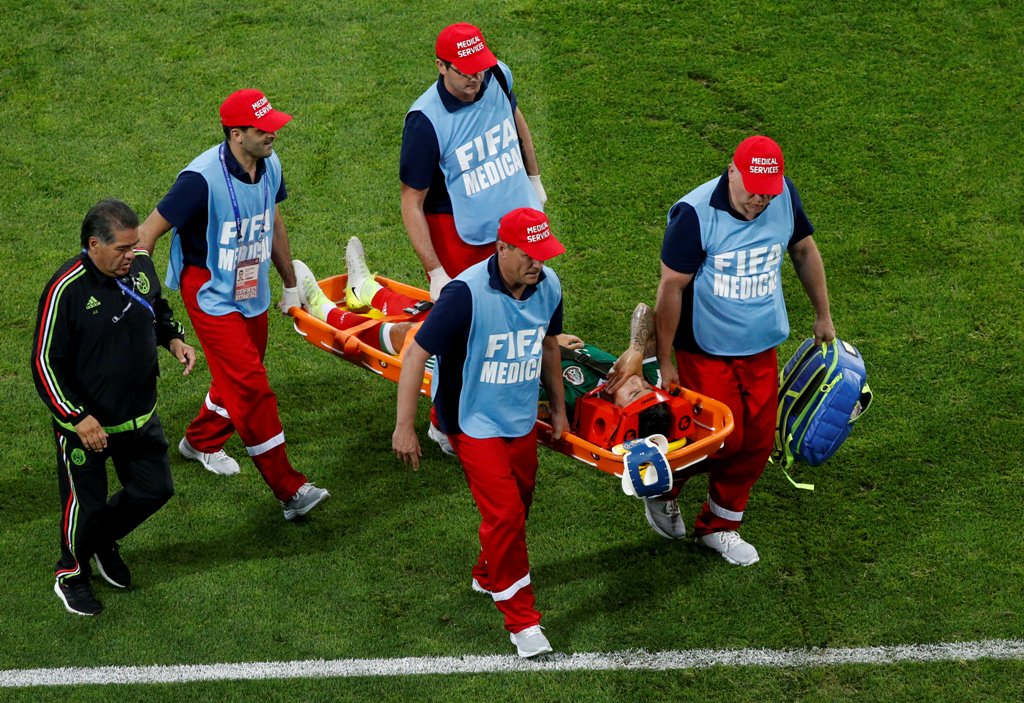 Mexico’s Carlos Salcedo is stretchered off injured REUTERS/Grigory Dukor
