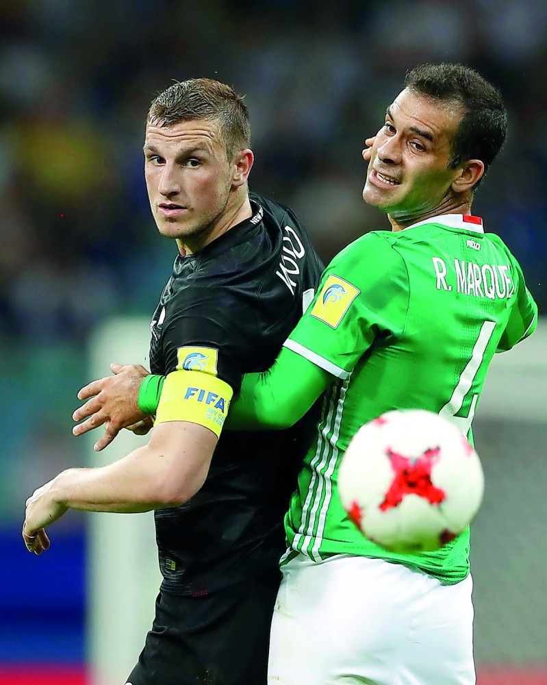 Mexico’s Rafael Marquez (right) in action against New Zealand’s Chris Wood during their Group A FIFA Confederations Cup match at Fisht Stadium in Sochi on Wednesday.