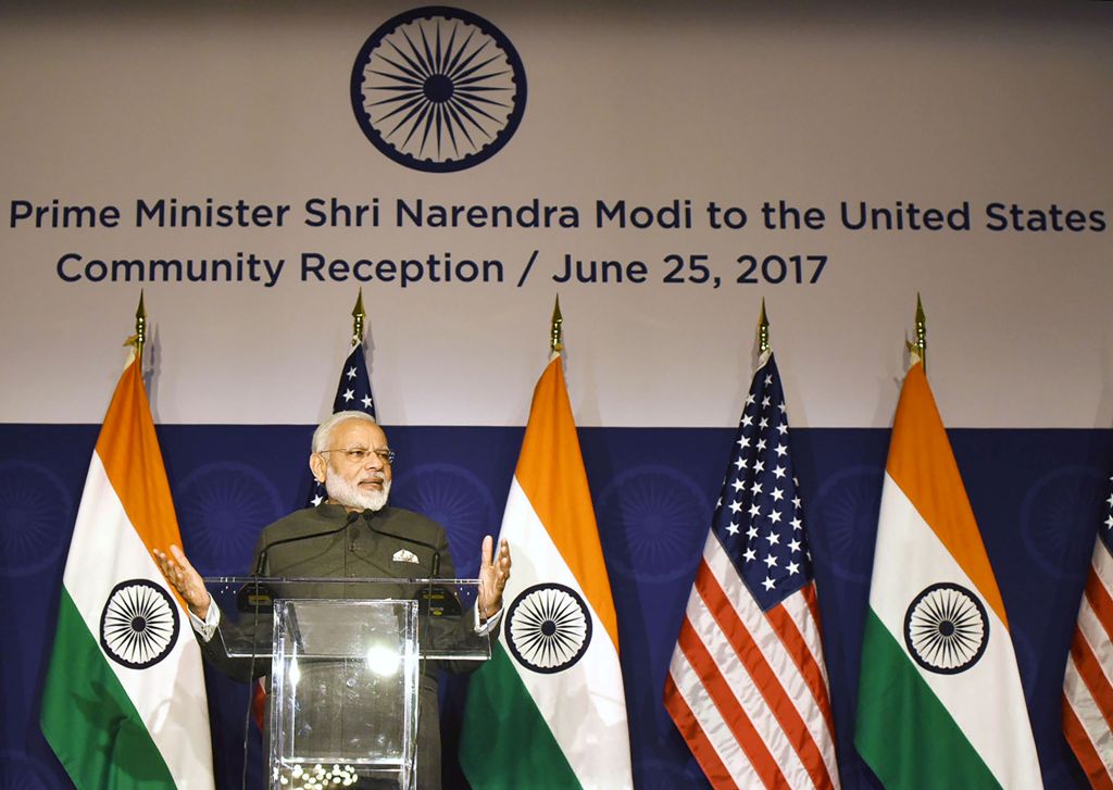 This handout photograph from the Indian Press Information Bureau (PIB) taken on June 25, 2017 shows Indian Prime Minister Narendra Modi attending a reception to meet members of the Indian community in the United States, in Washington DC on June 25, 2017. 