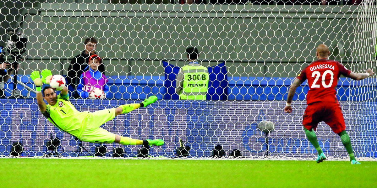 Chile’s goalkeeper Claudio Bravo saves a shot from Portugal’s Ricardo Quaresma during the penalty shootout of FIFA Confederations Cup Russia 2017 - semi final yesterday. Chile reached the final with a 3-0 win.