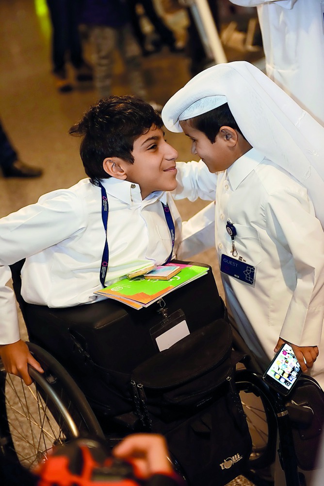 A social media influencer Ghanim Al Muftah (left) welcomes a visitor at HIA yesterday.