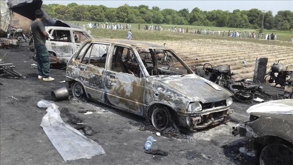 Destroyed vehicles are seen at the site of an overturned oil tanker which caught fire and killed 212 people after the explosion, near the Pakistani city of Bahawalpur in southern Punjab province, on June 25, 2017. The incident occurred on Sunday morning a