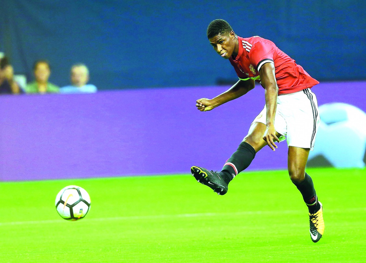 Manchester United forward Marcus Rashford scores against Manchester City during their International Champions Cup 2017 match at NRG Stadium in Houston, Texas on Thursday.