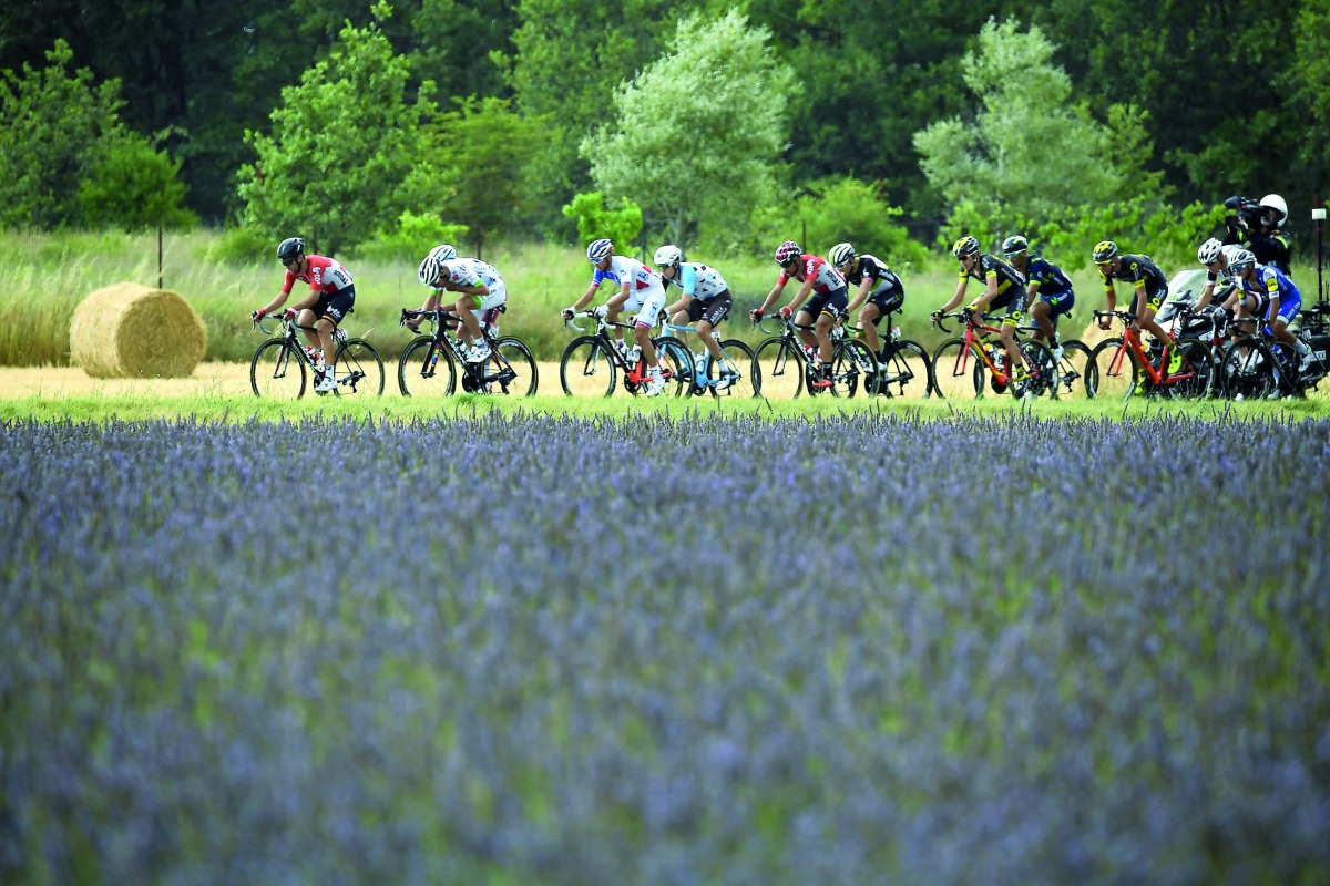 FROM LEFT: France’s Tony Gallopin, Croatia’s Robert Kiserlovski, France’s Pierre-Luc Perichon, Belgium’s Jan Bakelants, France’s Rudy Molard, Norway’s Edvald Boasson Hagen, Belgium’s Thomas De Gendt, Italy’s Daniele Bennati and France’s Romain Sicard ride