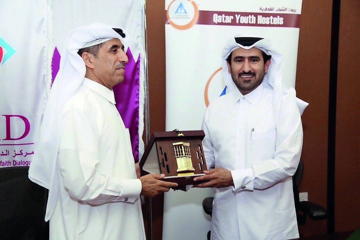 Dr Ibrahim Saleh Al Nuaimi (left), DICID Board Chairman, and Eng. Mohammed Mahdi Al Yami, Executive Director of Qatar Youth Hostels Association, at the event.