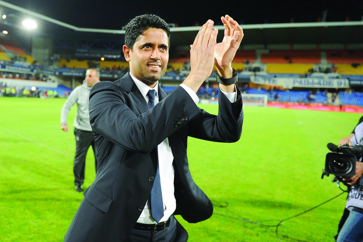 Paris Saint-Germain’s Qatari President Nasser Al Khelaifi applauds after PSG beat Montpellier at La Mosson Stadium in this file photo. Barcelona player Neymar is set for world record move to Paris Saint-Germain when the player jets into France today.