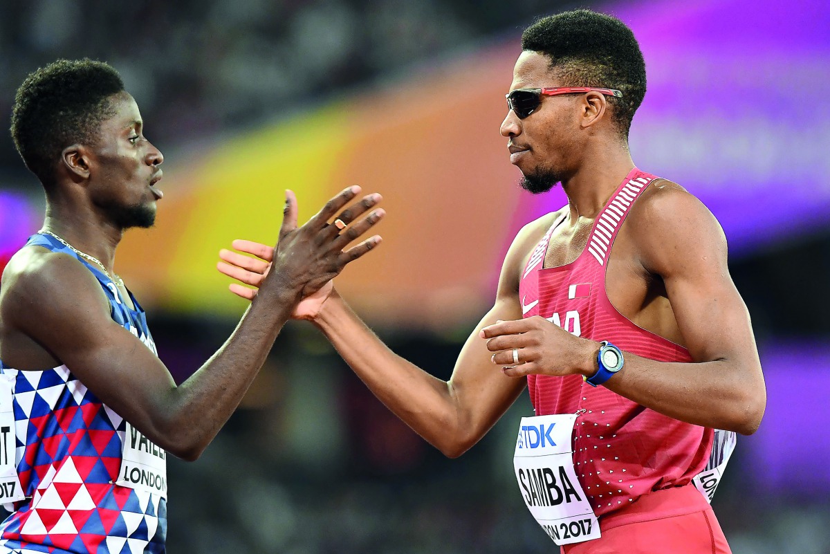 Qatar’s Abderrahaman Samba (right) is congratulated by French athlete Ludvy Vaillant after he won the men’s 400m hurdles heat-three of the 2017 IAAF World Championships at the London Stadium in London yesterday.