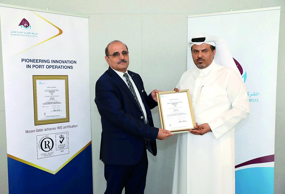 Mohammed Al Maadeed, Chief Support Services Officer of Mwani Qatar, receiving the certificate. 