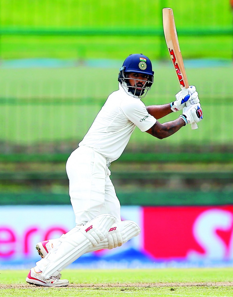 India’s Shikhar Dhawan watches the ball after hitting a cut during the first day of the third and final Test match against Sri Lanka at the Pallekele International Cricket Stadium in Pallekele, Kandy yesterday.