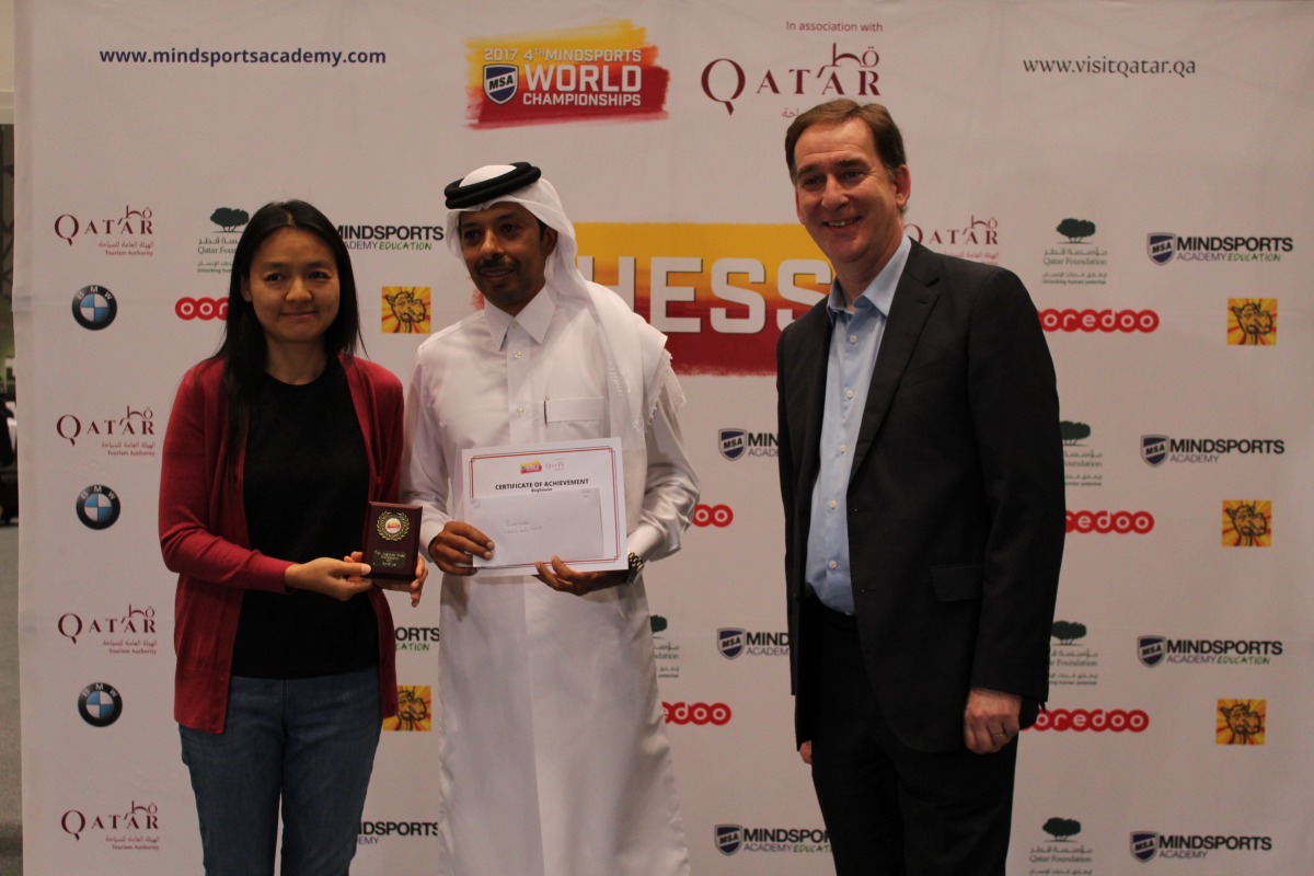 World Mindsports winners being awarded their prize at the event.