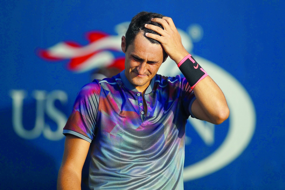 Bernard Tomic of Australia reacts during his 2017 US Open first round Men’s Singles match against Gilles Muller of Luxembourg on Monday. Tomic lost 3-6, 6-3, 6-4, 6-4.