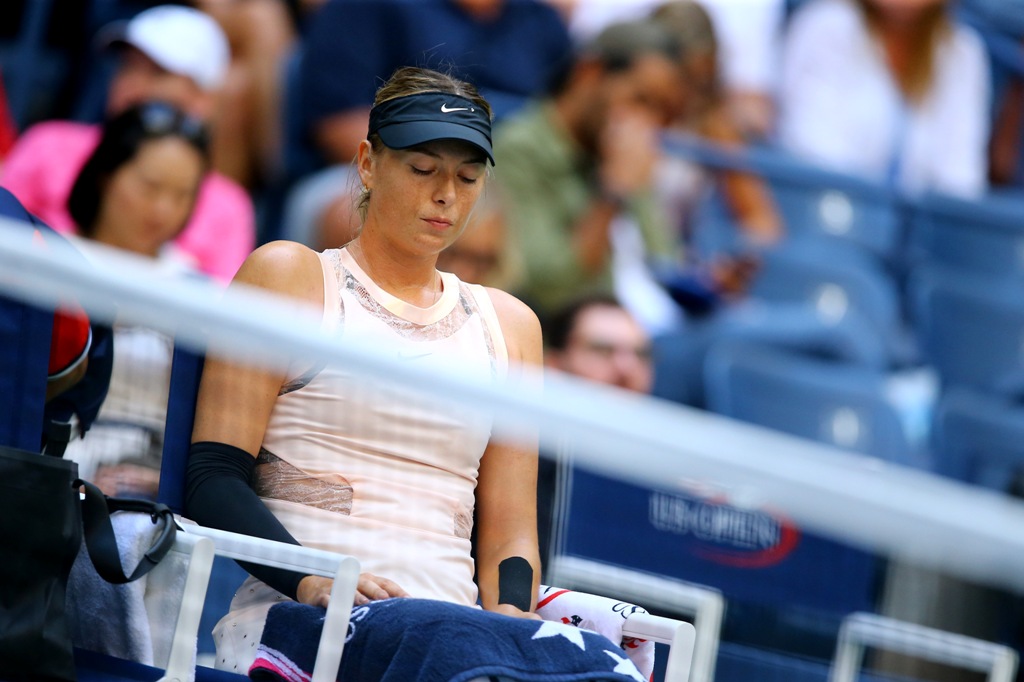 Maria Sharapova of Russia sits during of her Women's Singles round two tennis match against Timea Babos (not seen) of Hungary within 2017 US Open Tennis Championships at Arthur Ashe Stadium in New York, United States on August 30, 2017. ( Volkan Furuncu -