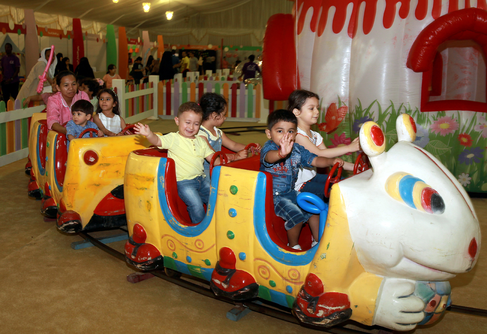 Children enjoying a ride. Pic: Qassim Rahmatullah © The Peninsula