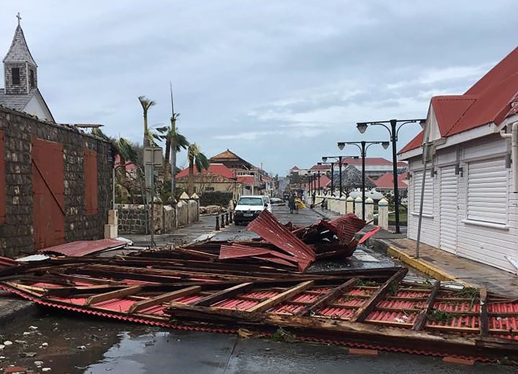 A picture released on the Facebook account of Kevin Barrallon on September 7, 2017 shows wreckages in a street of Gustavia on the French overseas collectivity of Saint-Barthelemy in the Caribbean following hurricane Irma.  AFP / FACEBOOK