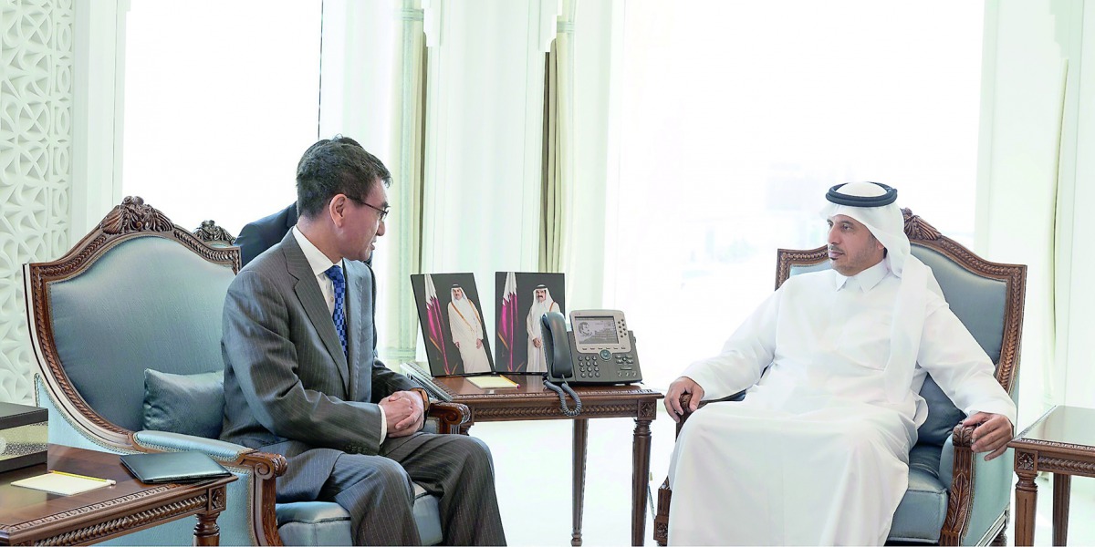 Prime Minister and Interior Minister H E Sheikh Abdullah bin Nasser bin Khalifa Al Thani with Japan’s Minister of Foreign Affairs, Taro Kono, in Doha yesterday. They reviewed bilateral relations and ways of enhancing them in all fields, in addition to a n