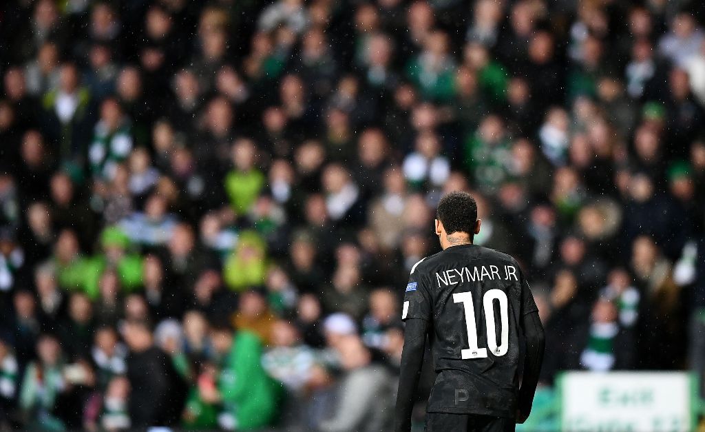 Paris Saint-Germain's Brazilian striker Neymar in the rain during the UEFA Champions League Group B football match between Celtic and Paris Saint-Germain (PSG) at Celtic Park in Glasgow, on September 12, 2017. PSG won the game 5-0. / AFP / FRANCK FIFE