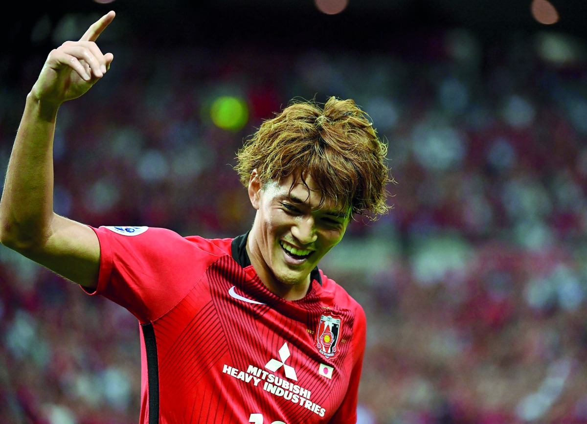 Urawa Reds forward Toshiyuki Takagi celebrates his goal during AFC Champions League quarter-final match against Kawasaki Frontale in Saitama, yesterday.