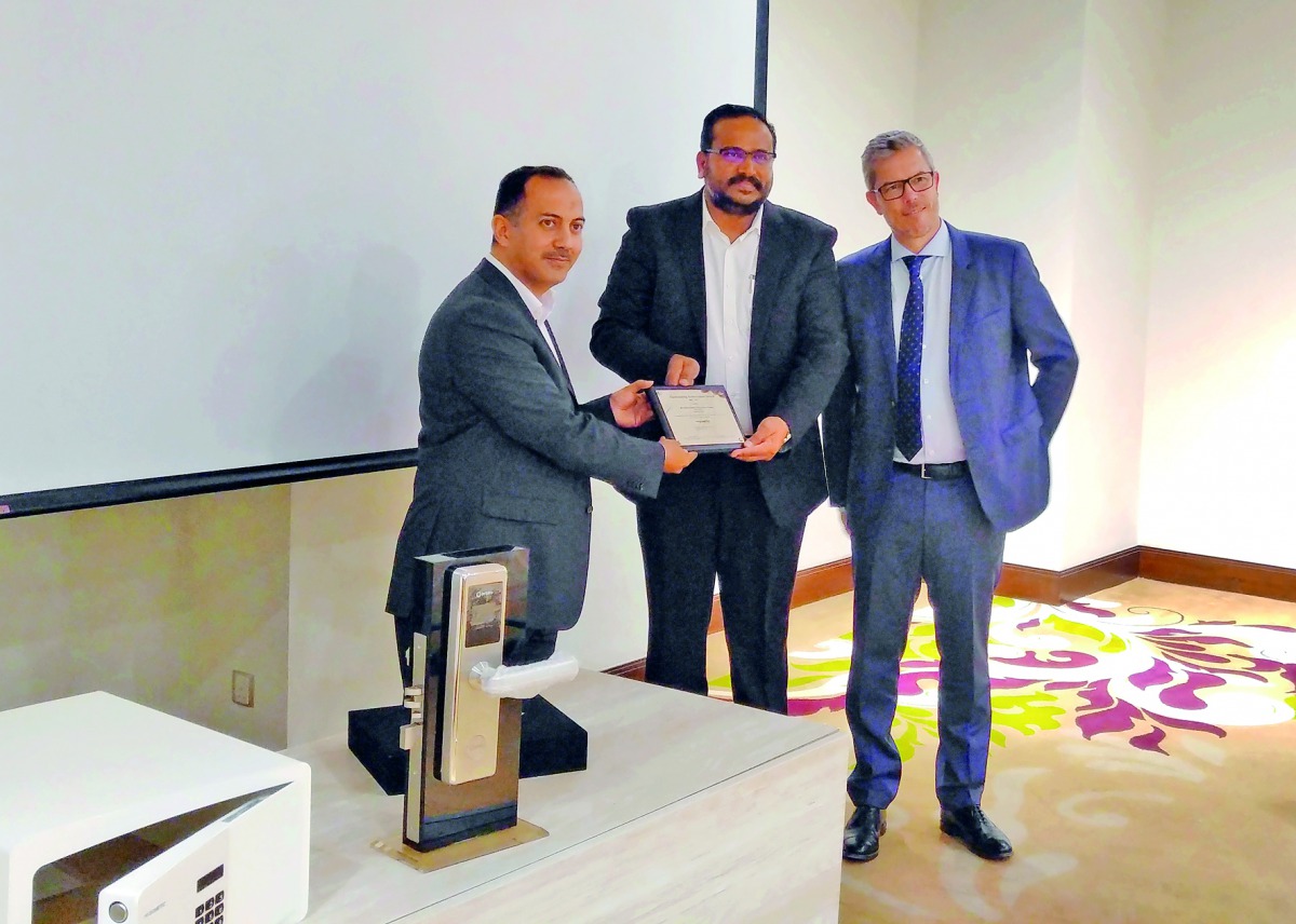 Video Home officials receiving the award from Dometic.