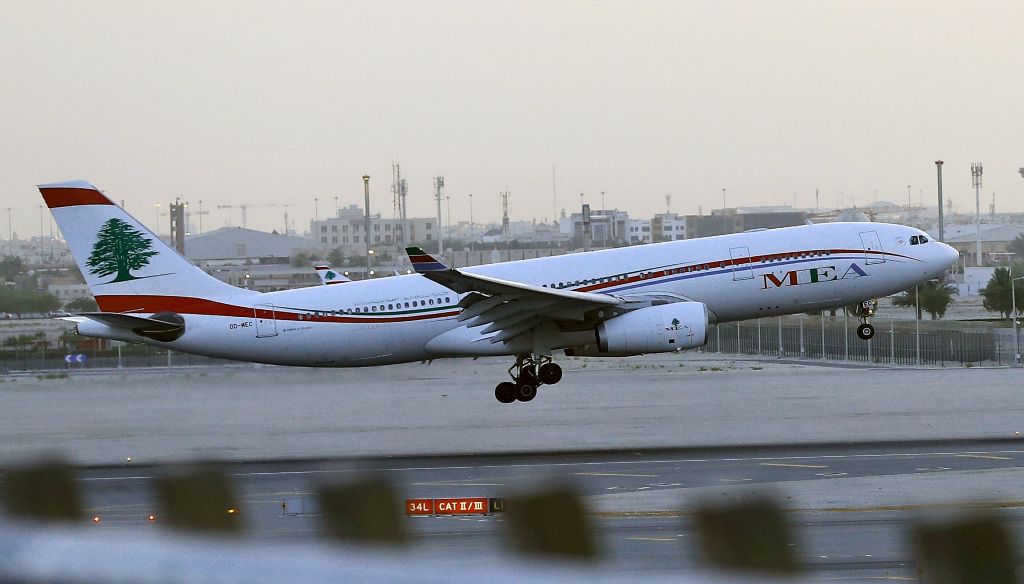 (FILES) This file photo taken on June 12, 2017 shows a plane from Lebanese carrier Middle East Airlines landing at Hamad International Airport in Doha. AFP / KARIM JAAFAR
