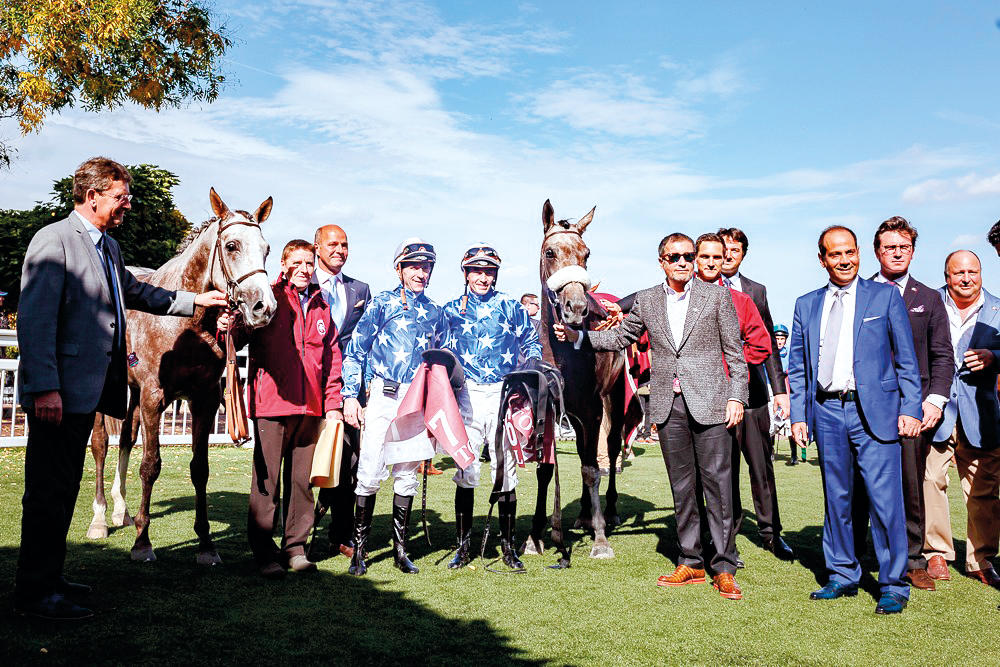 H E Sheik Mohammed Bin Khalifa Al Thani-owned Rajeh and his team pose for a photograph after the  colt won the Qatar Arabian Trophy des Poulains (Gr1 PA) at Saint-Cloud, France yesterday. INSET: H E Sheik Mohammed Bin Khalifa Al Thani receiving the winner