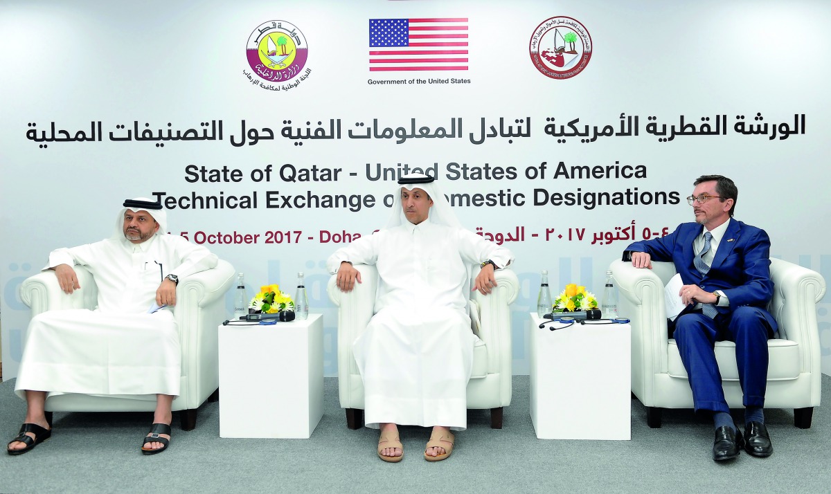 Deputy Governor of Qatar Central Bank, H E Sheikh Fahad bin Faisal Al Thani (centre), with Abdulaziz Al Ansari (left), Chairman of the National Counter-Terrorism Committee; and William Grant, Charge d’Affaires, ad Interim at US Embassy Doha, at the worksh
