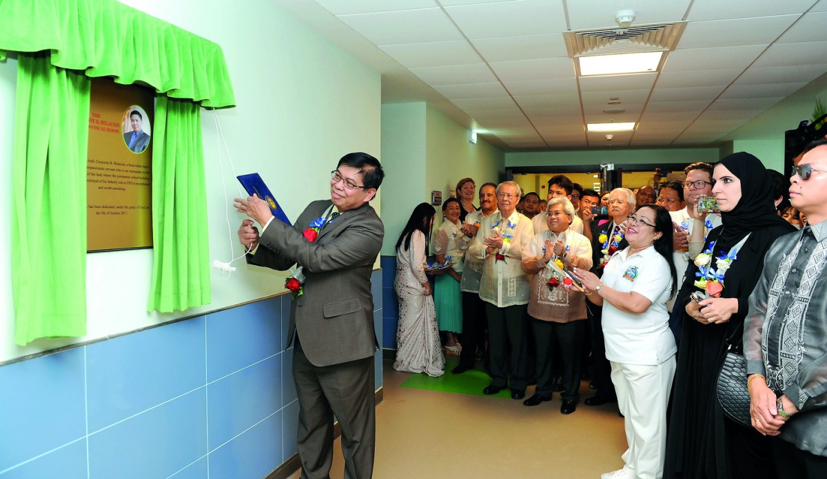 Former Ambassador to Qatar Crescente R. Relacion unveils the Crescente R. Relacion Audio-Visual Room as guests and officials look on during the official inauguration of Philippine School Doha and 25th Anniversary of Foundation Day celebrations yesterday. 